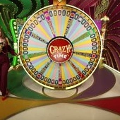 889JL baccarat table showing cards being dealt in a luxury casino environment